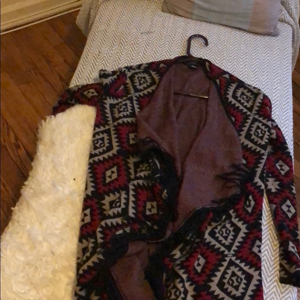 Sweater , runs like a medium